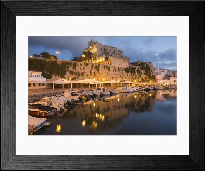 Framed Print : View across tranquil harbour to the illuminated Town Hall at dusk, Ciutadella (Ciudadela) Framed Print : View across tranquil harbour to the illuminated Town Hall at dusk, Ciutadella (Ciudadela)