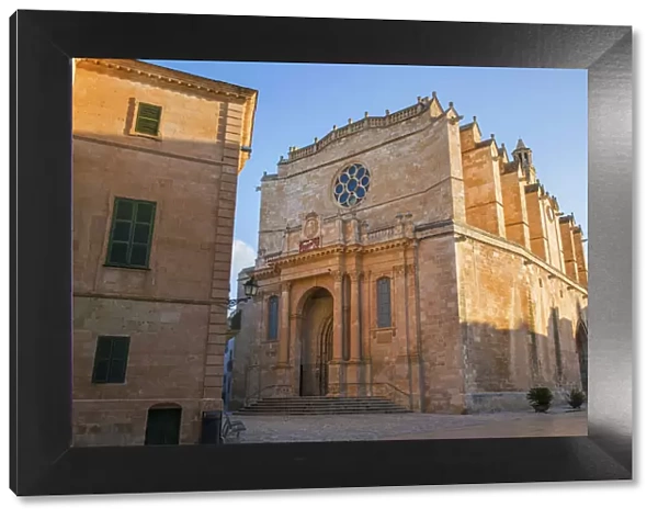 Golden sandstone facade of the Cathedral of Santa Maria, sunrise, Ciutadella (Ciudadela)