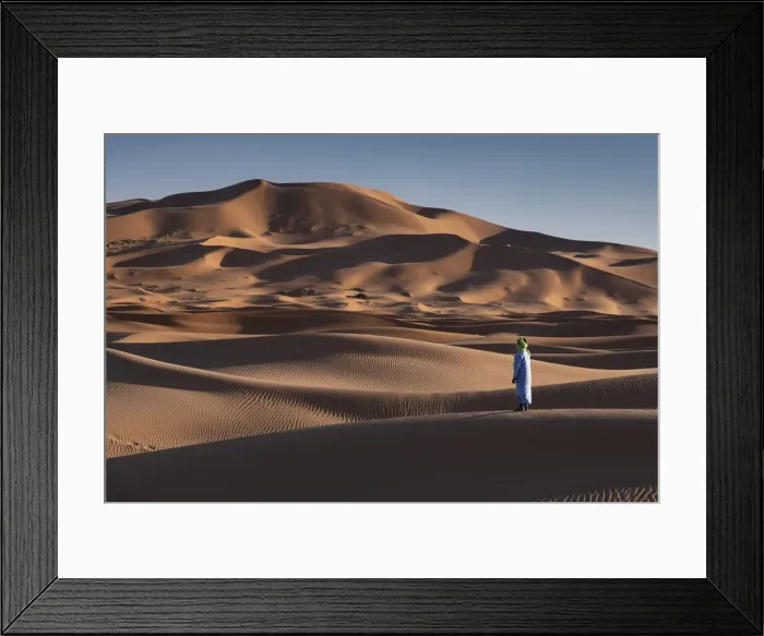 Framed Print : A Berber man in traditional dress in the Sand Dunes of Erg Chebbi, Sahara Desert, Morocco Framed Print : A Berber man in traditional dress in the Sand Dunes of Erg Chebbi, Sahara Desert, Morocco