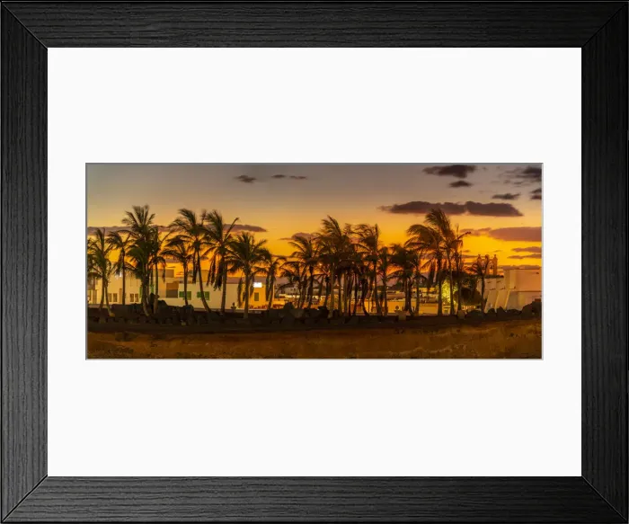 Framed Print : View of golden sunset through palm trees, Playa Blanca, Lanzarote, Canary Islands, Spain Framed Print : View of golden sunset through palm trees, Playa Blanca, Lanzarote, Canary Islands, Spain