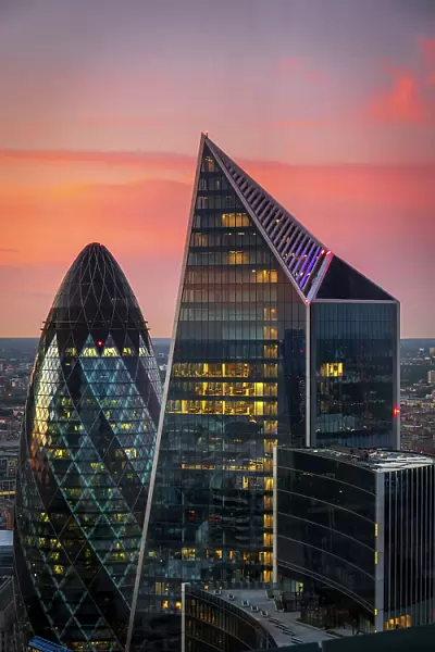 The Gherkin and Scalpel buildings in the City of London at dusk, London, England