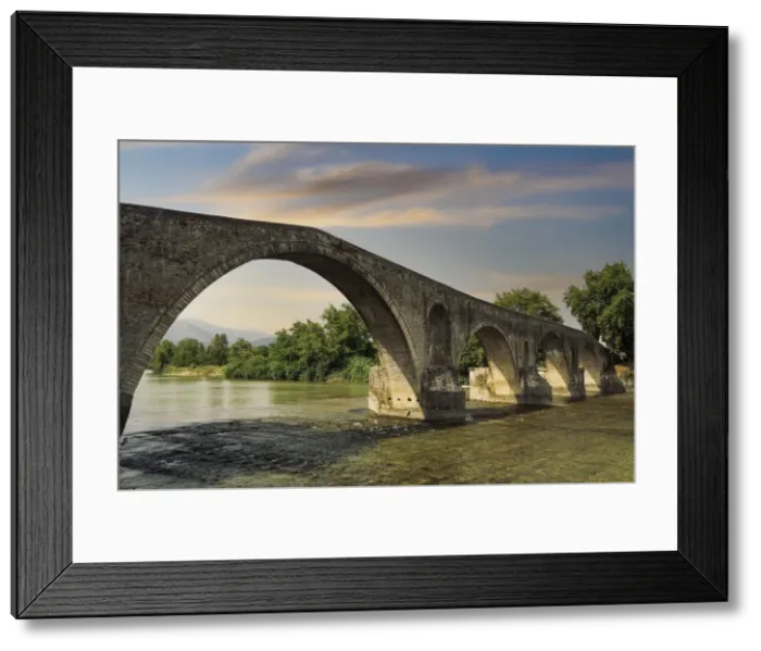Framed Print : Day view of historic stone bridge of Arta above the Arachthos River, Arta, Epirus region, Greece, Europe Framed Print : Day view of historic stone bridge of Arta above the Arachthos River, Arta, Epirus region, Greece, Europe