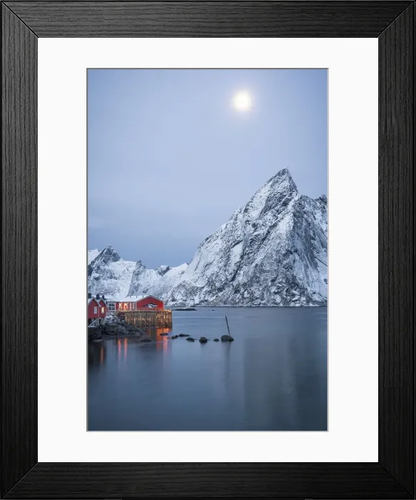 Framed Print : Red Rorbu cabins and majestic Olstind peak lit by moon during winter dusk, Hamnoy, Nordland county, Lofoten Islands, Norway, Scandinavia, Europe Framed Print : Red Rorbu cabins and majestic Olstind peak lit by moon during winter dusk, Hamnoy, Nordland county, Lofoten Islands, Norway, Scandinavia, Europe