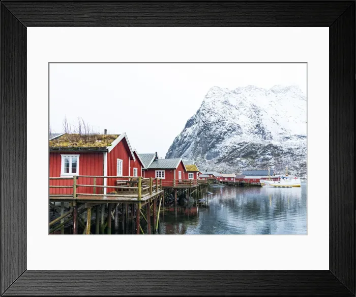 Framed Print : Traditional thatched roofed red cabins with majestic Reinebringen mountain in the background, Reine port, Lofoten Islands, Norway, Scandinavia, Europe Framed Print : Traditional thatched roofed red cabins with majestic Reinebringen mountain in the background, Reine port, Lofoten Islands, Norway, Scandinavia, Europe