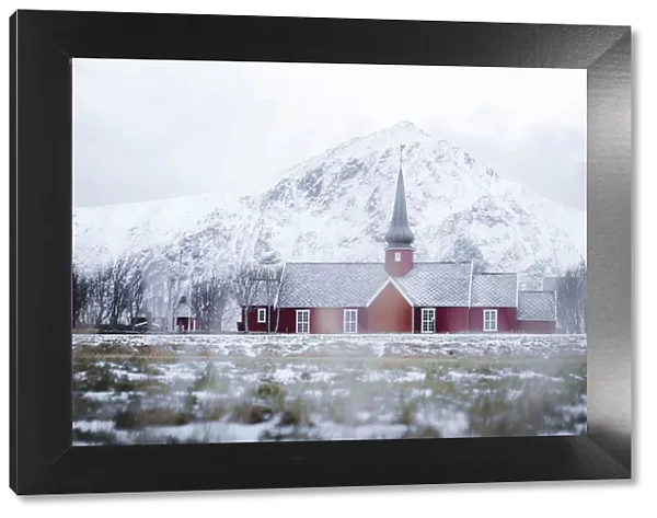Red church of Flakstad in winter fog, Flakstad, Nordland county, Lofoten Islands, Norway, Scandinavia, Europe