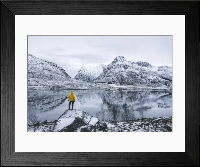Framed Print : Person admiring the snowcapped mountains reflected in frozen sea, Flakstadpollen, Flakstadoya, Nordland, Lofoten Islands, Norway, Scandinavia, Europe Framed Print : Person admiring the snowcapped mountains reflected in frozen sea, Flakstadpollen, Flakstadoya, Nordland, Lofoten Islands, Norway, Scandinavia, Europe