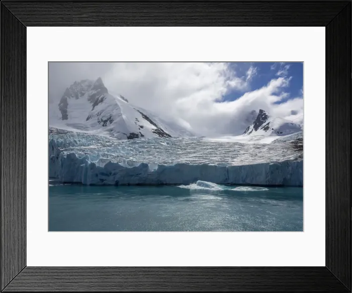 Framed Print : A view of snow-capped mountains and a shooter from the glacier in Drygalski Fjord, South Georgia, South Atlantic, Polar Regions Framed Print : A view of snow-capped mountains and a shooter from the glacier in Drygalski Fjord, South Georgia, South Atlantic, Polar Regions
