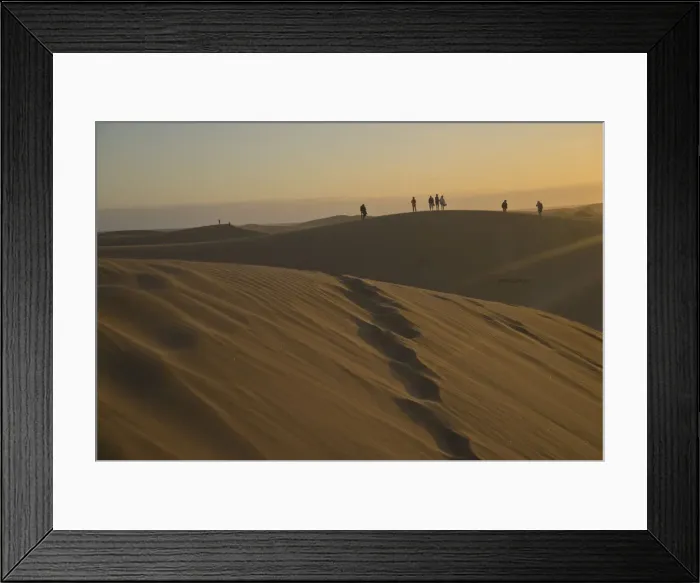Framed Print : Young people watching the sunset at Maspalomas sand dunes, near Playa de los Ingleses, Gran Canaria, Canary Islands, Spain, Atlantic, Europe Framed Print : Young people watching the sunset at Maspalomas sand dunes, near Playa de los Ingleses, Gran Canaria, Canary Islands, Spain, Atlantic, Europe