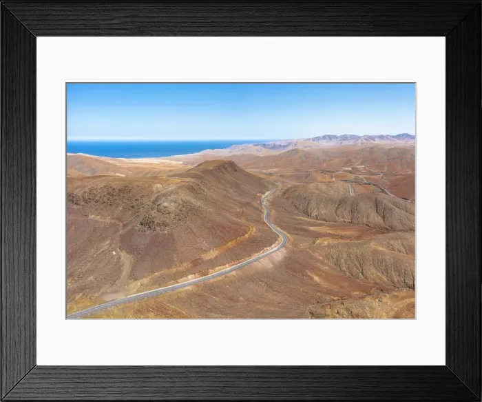Framed Print : Winding road crossing the volcanic landscape towards Sicasumbre Astronomical Observatory, Fuerteventura, Canary Islands, Spain, Atlantic, Europe Framed Print : Winding road crossing the volcanic landscape towards Sicasumbre Astronomical Observatory, Fuerteventura, Canary Islands, Spain, Atlantic, Europe