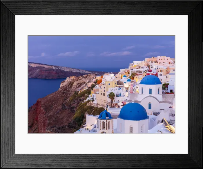 Framed Print : Blue domed white church and colourful buildings at sunrise, Oia, Santorini, Cyclades, Greek Islands, Greece, Europe Framed Print : Blue domed white church and colourful buildings at sunrise, Oia, Santorini, Cyclades, Greek Islands, Greece, Europe