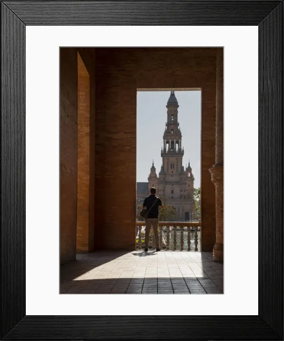 Framed Print : Man enjoying the view of Plaza de Espana, framed through an archway, Seville, Andalusia, Spain, Europe Framed Print : Man enjoying the view of Plaza de Espana, framed through an archway, Seville, Andalusia, Spain, Europe