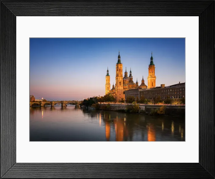 Framed Print : Basilica del Pilar Cathedral with stone bridge crossing Ebro River at sunset, Zaragoza, Aragon, Spain, Europe Framed Print : Basilica del Pilar Cathedral with stone bridge crossing Ebro River at sunset, Zaragoza, Aragon, Spain, Europe