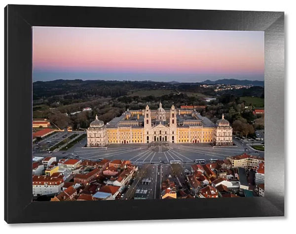 City drone aerial view at sunset with iconic Palace, Mafra, Portugal, Europe