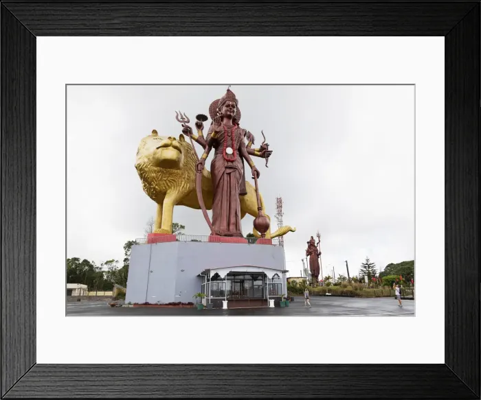 Framed Print : Statue of the Hindu goddess Durga, 108 feet tall, with her lion vehicle Manastala, at Ganga Talao, Mauritius, Indian Ocean, Africa Framed Print : Statue of the Hindu goddess Durga, 108 feet tall, with her lion vehicle Manastala, at Ganga Talao, Mauritius, Indian Ocean, Africa