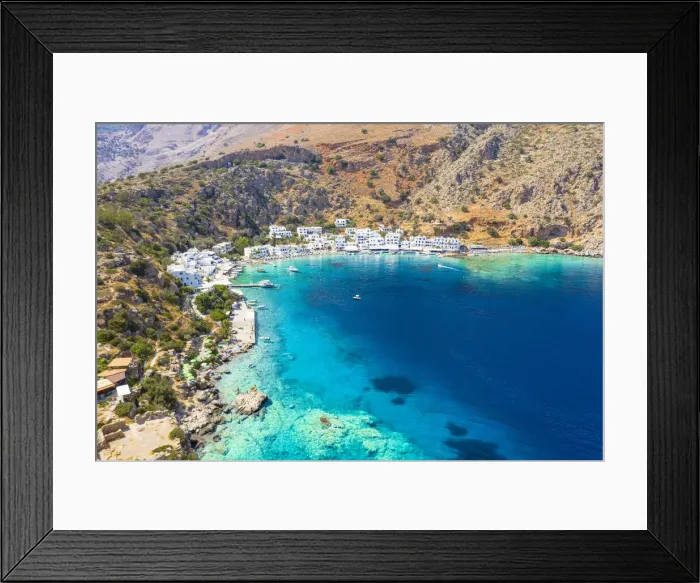 Framed Print : Aerial view of traditional whitewashed buildings of Loutro village and transparent sea, Crete island, Greek Islands, Greece, Europe Framed Print : Aerial view of traditional whitewashed buildings of Loutro village and transparent sea, Crete island, Greek Islands, Greece, Europe