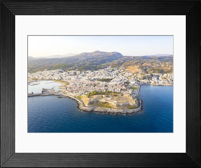 Framed Print : Aerial view of old Venetian harbor and Fortezza, citadel of the seaside town of Rethymno, Crete island, Greek Islands, Greece, Europe Framed Print : Aerial view of old Venetian harbor and Fortezza, citadel of the seaside town of Rethymno, Crete island, Greek Islands, Greece, Europe