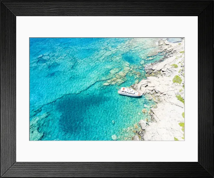 Framed Print : Aerial view of yacht moored in the crystal clear sea, Crete island, Greek Islands, Greece, Europe Framed Print : Aerial view of yacht moored in the crystal clear sea, Crete island, Greek Islands, Greece, Europe