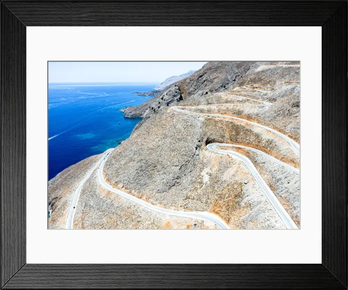 Framed Print : Hairpin bends of mountain road leading to the blue sea, aerial view, Crete island, Greek Islands, Greece, Europe Framed Print : Hairpin bends of mountain road leading to the blue sea, aerial view, Crete island, Greek Islands, Greece, Europe