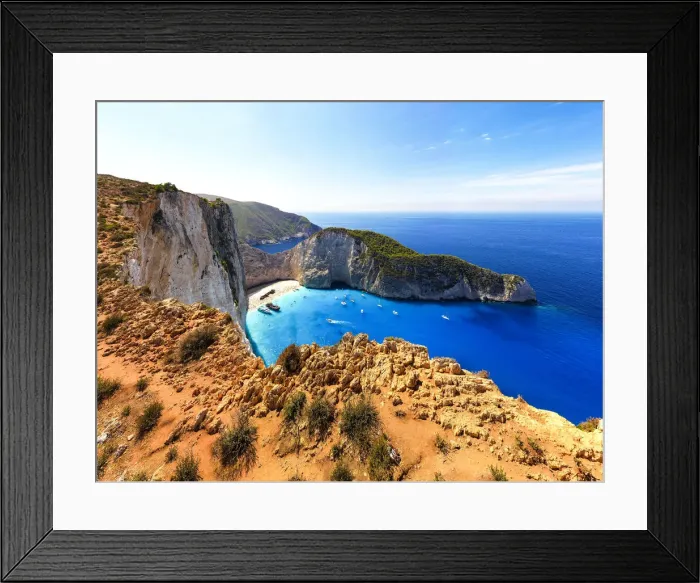 Framed Print : Aerial view of majestic cliffs above the idyllic Navagio Beach (Shipwreck Beach), Zakynthos island, Greek Islands, Greece, Europe Framed Print : Aerial view of majestic cliffs above the idyllic Navagio Beach (Shipwreck Beach), Zakynthos island, Greek Islands, Greece, Europe