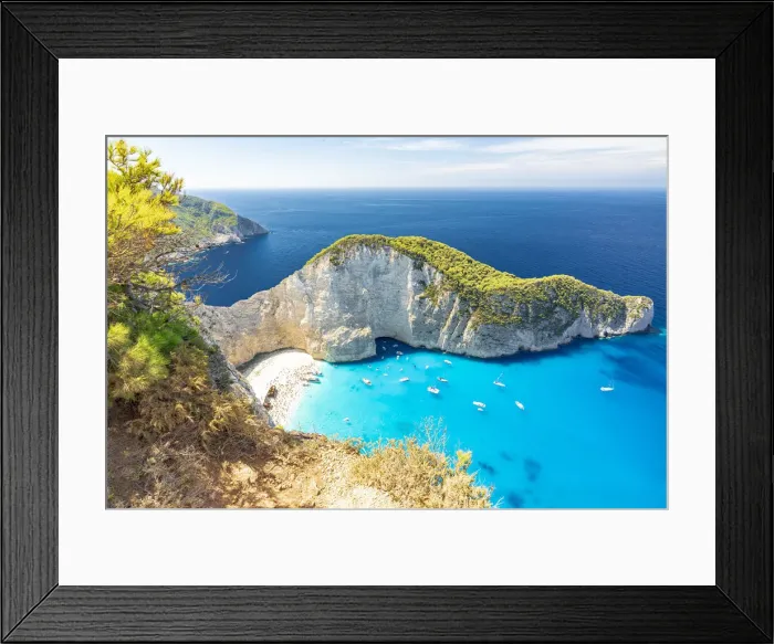 Framed Print : Turquoise sea washing the white sand of Navagio Beach (Shipwreck Beach) view from clifftop, Zakynthos island, Greek Islands, Greece, Europe Framed Print : Turquoise sea washing the white sand of Navagio Beach (Shipwreck Beach) view from clifftop, Zakynthos island, Greek Islands, Greece, Europe