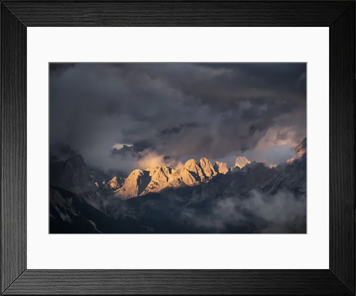 Framed Print : Light rays hitting Dolomites mountain peaks at sunset, surrounded by low clouds and mist, Cortina d Ampezzo, Dolomites, Veneto, Italy, Europe Framed Print : Light rays hitting Dolomites mountain peaks at sunset, surrounded by low clouds and mist, Cortina d Ampezzo, Dolomites, Veneto, Italy, Europe