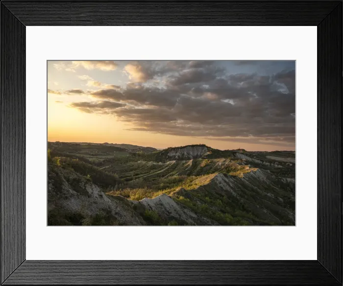 Framed Print : Sunset above badlands and countryside with colored clouds in the sky, Bologna, Emilia Romagna, Italy, Europe Framed Print : Sunset above badlands and countryside with colored clouds in the sky, Bologna, Emilia Romagna, Italy, Europe