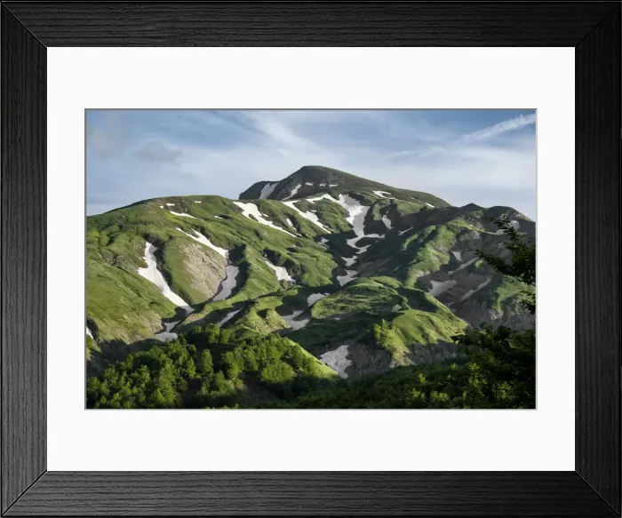 Framed Print : Cusna Mountain with lush green grass and some melting snow zone, Emilia Romagna, Italy, Europe Framed Print : Cusna Mountain with lush green grass and some melting snow zone, Emilia Romagna, Italy, Europe