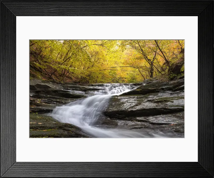 Framed Print : Autumn colors and foliage in a forest with a waterfall flowing between rocks, Emilia Romagna, Italy, Europe Framed Print : Autumn colors and foliage in a forest with a waterfall flowing between rocks, Emilia Romagna, Italy, Europe