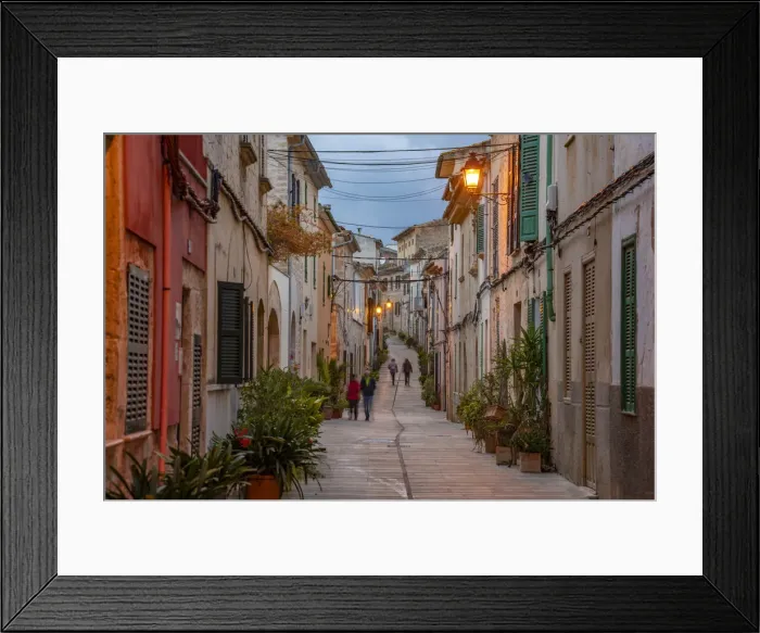 Framed Print : People in street in narrow street at dusk in the old town of Alcudia, Alcudia, Majorca, Balearic Islands, Spain, Mediterranean, Europe Framed Print : People in street in narrow street at dusk in the old town of Alcudia, Alcudia, Majorca, Balearic Islands, Spain, Mediterranean, Europe