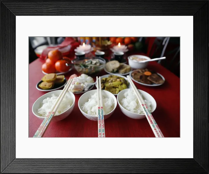 Framed Print : Chinese Lunar New Year, Vietnamese Tet celebration, food and offerings on table, religion at home, Haute Savoie, France, Europe Framed Print : Chinese Lunar New Year, Vietnamese Tet celebration, food and offerings on table, religion at home, Haute Savoie, France, Europe