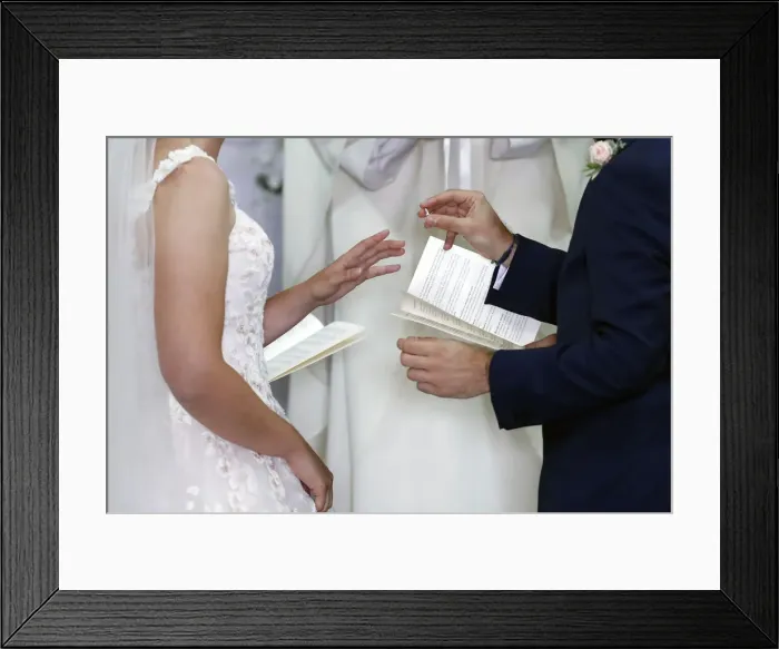 Framed Print : Wedding ceremony in a Catholic church, wedding rings being exchanged, France, Europe Framed Print : Wedding ceremony in a Catholic church, wedding rings being exchanged, France, Europe