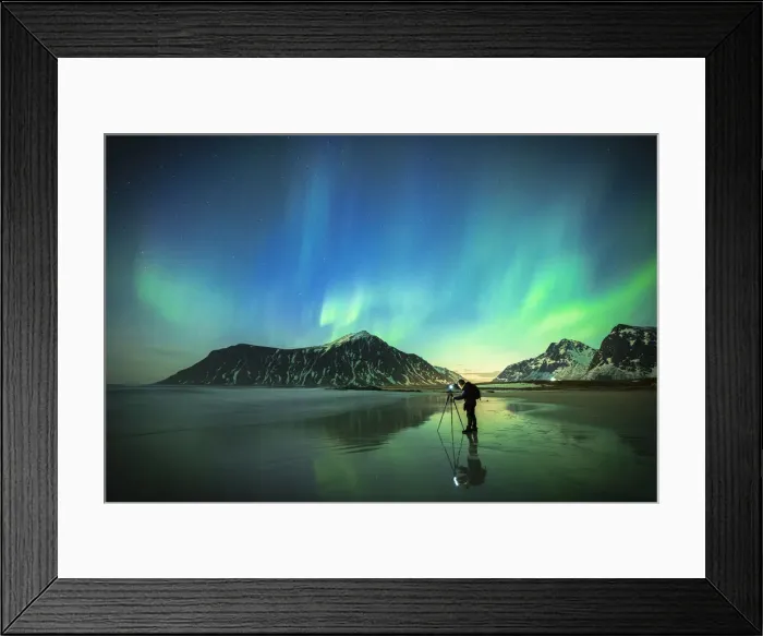 Framed Print : Person photographing the bright sky during Aurora Borealis (Northern Lights) standing on Skagsanden beach, Lofoten Islands, Norway, Scandinavia, Europe Framed Print : Person photographing the bright sky during Aurora Borealis (Northern Lights) standing on Skagsanden beach, Lofoten Islands, Norway, Scandinavia, Europe