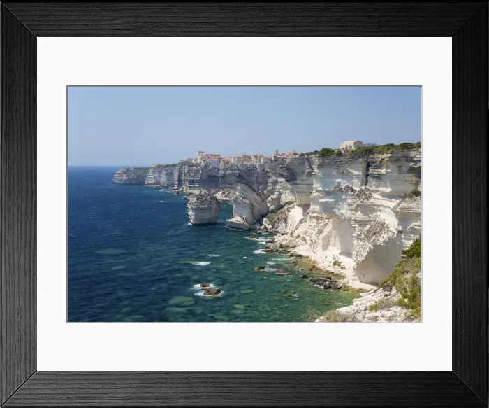 Framed Print : View over rocky cove along rugged limestone cliffs to the distant citadel, Bonifacio, Corse-du-Sud, Corsica, France, Mediterranean, Europe Framed Print : View over rocky cove along rugged limestone cliffs to the distant citadel, Bonifacio, Corse-du-Sud, Corsica, France, Mediterranean, Europe