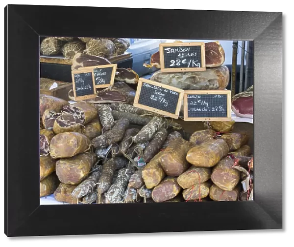 Selection of Corsican sausages and hams for sale at open-air market in Place Foch, Ajaccio, Corse-du-Sud, Corsica, France, Mediterranean, Europe