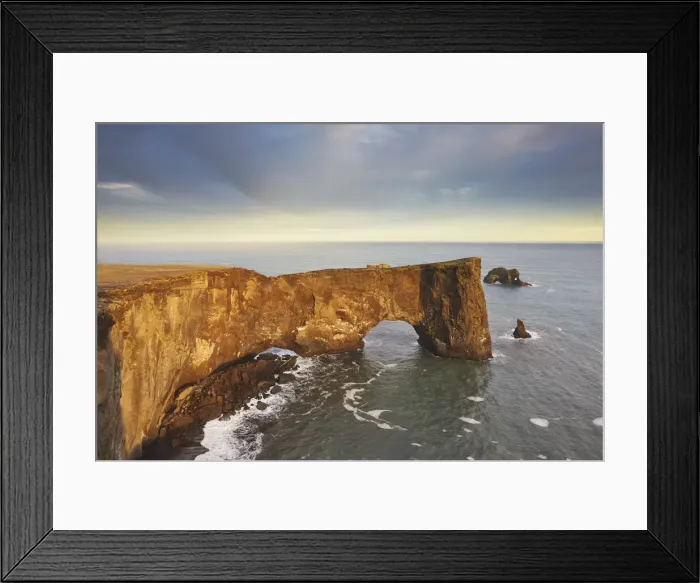 Framed Print : A rock arch on Dyrholaey Island seen in sunset sunlight, near Vik, south coast of Iceland, Polar Regions Framed Print : A rock arch on Dyrholaey Island seen in sunset sunlight, near Vik, south coast of Iceland, Polar Regions
