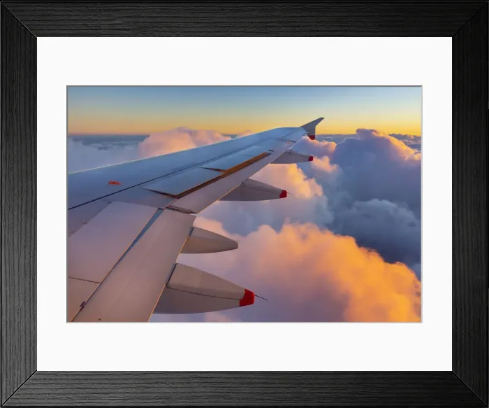 Framed Print : Airplane wing at sunset over clouds, Italy, Europe Framed Print : Airplane wing at sunset over clouds, Italy, Europe