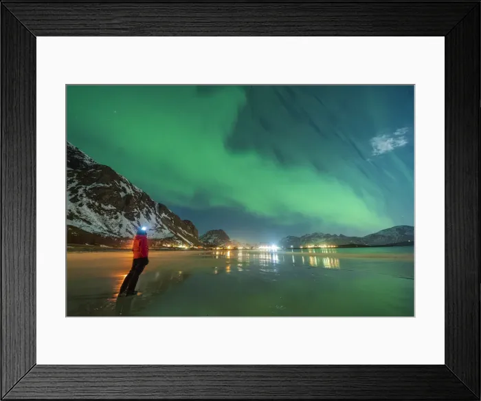 Framed Print : Hiker with head torch watching the Aurora Borealis (Northern Lights) standing on Ramberg beach, Nordland county, Lofoten Islands, Norway, Scandinavia, Europe Framed Print : Hiker with head torch watching the Aurora Borealis (Northern Lights) standing on Ramberg beach, Nordland county, Lofoten Islands, Norway, Scandinavia, Europe