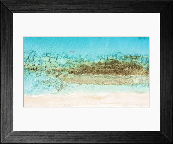 Framed Print : Aerial view of woman floating on the crystal sea in between coral reef and white sand beach, Antigua, West Indies, Caribbean, Central America Framed Print : Aerial view of woman floating on the crystal sea in between coral reef and white sand beach, Antigua, West Indies, Caribbean, Central America