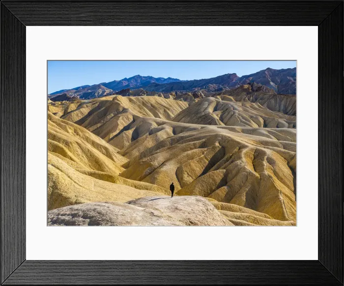 Framed Print : Hiker in the colourful sandstone formations, Zabriskie Point, Death Valley, California, United States of America, North America Framed Print : Hiker in the colourful sandstone formations, Zabriskie Point, Death Valley, California, United States of America, North America