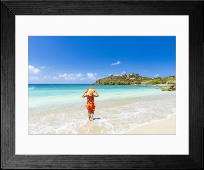Framed Print : Beautiful woman with orange dress and straw hat standing on a tropical beach, Antigua, West Indies, Caribbean, Central America Framed Print : Beautiful woman with orange dress and straw hat standing on a tropical beach, Antigua, West Indies, Caribbean, Central America