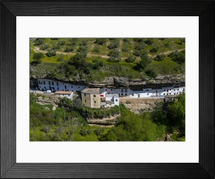 Framed Print : Dwellings built into rock overhangs above the Rio Guadalporcun, Setenil de las Bodegas, Andalucia, Spain, Europe Framed Print : Dwellings built into rock overhangs above the Rio Guadalporcun, Setenil de las Bodegas, Andalucia, Spain, Europe