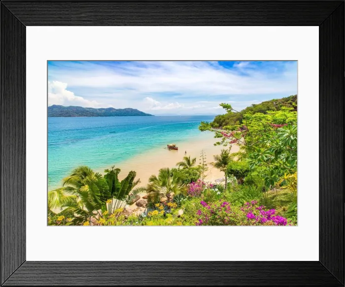 Framed Print : Outrigger boat seen through vegetation on the beach at Nosy Komba, North West Madagascar, Indian Ocean, Africa Framed Print : Outrigger boat seen through vegetation on the beach at Nosy Komba, North West Madagascar, Indian Ocean, Africa