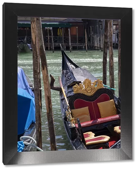 Gondola moored along a canal, Venice, UNESCO World Heritage Site, Veneto, Italy, Europe