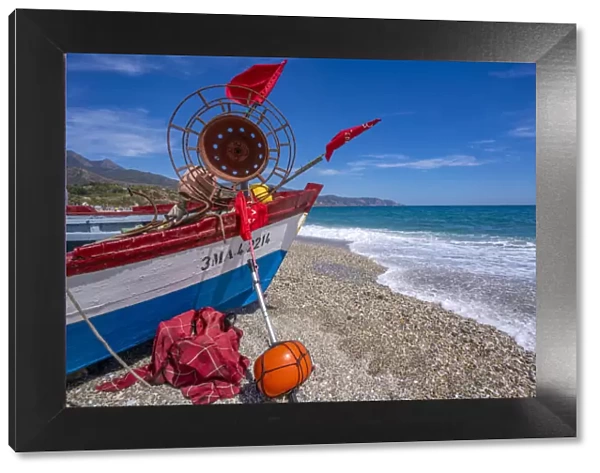 View of boat on Playa de Burriana beach in Nerja, Costa del Sol, Malaga Province, Andalusia, Spain, Mediterranean, Europe