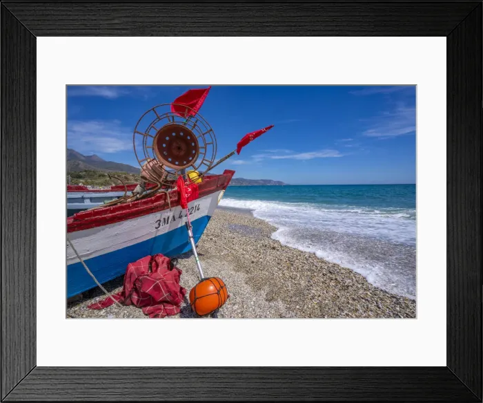 Framed Print : View of boat on Playa de Burriana beach in Nerja, Costa del Sol, Malaga Province, Andalusia, Spain, Mediterranean, Europe Framed Print : View of boat on Playa de Burriana beach in Nerja, Costa del Sol, Malaga Province, Andalusia, Spain, Mediterranean, Europe