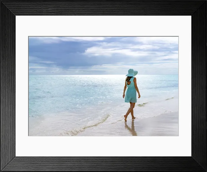 Framed Print : Woman walking on a white sand beach under the cloudy sky at sunset, Barbuda, Antigua and Barbuda, West Indies, Caribbean, Central America Framed Print : Woman walking on a white sand beach under the cloudy sky at sunset, Barbuda, Antigua and Barbuda, West Indies, Caribbean, Central America