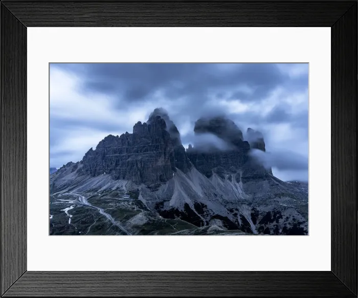 Framed Print : Clouds at dusk in the foggy sky over Tre Cime di Lavaredo mountain peaks, Dolomites, South Tyrol, Italy, Europe Framed Print : Clouds at dusk in the foggy sky over Tre Cime di Lavaredo mountain peaks, Dolomites, South Tyrol, Italy, Europe