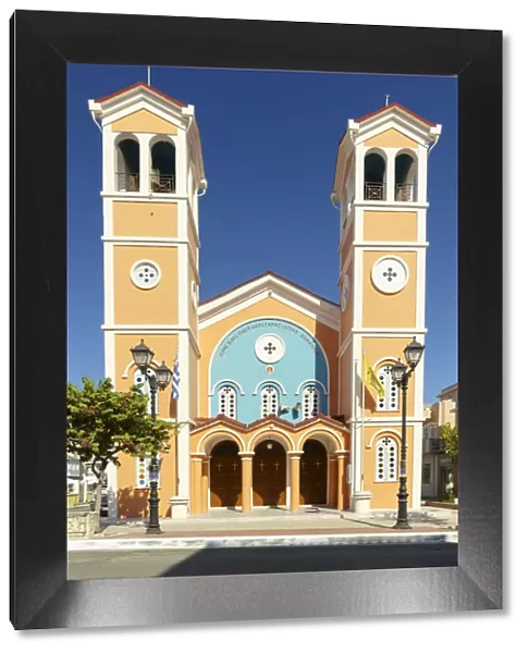 Facade and twin bell towers of church in Lixouri old town, Kefalonia, Ionian Islands, Greek Islands, Greece, Europe