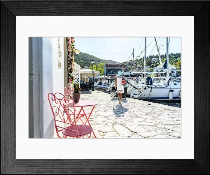 Framed Print : Woman looking at sailboats in the small harbor of the coastal village of Fiskardo, Kefalonia, Ionian Islands, Greek Islands, Greece, Europe Framed Print : Woman looking at sailboats in the small harbor of the coastal village of Fiskardo, Kefalonia, Ionian Islands, Greek Islands, Greece, Europe
