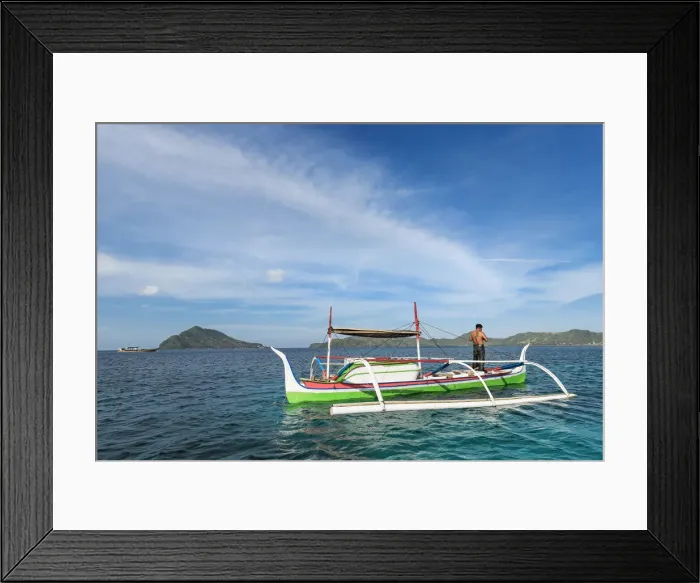 Framed Print : Outrigger canoe off Bahuis Island and the southern tip of Siau, Siau Island, Sangihe Archipelago, North Sulawesi, Indonesia, Southeast Asia, Asia